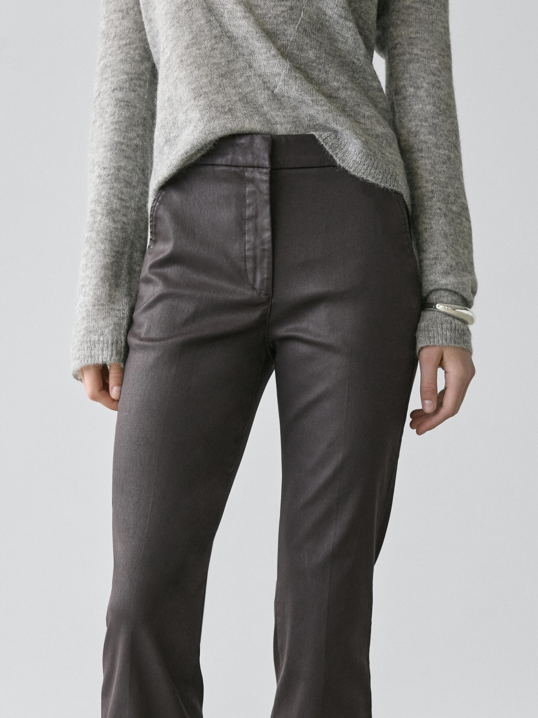 Waxed flare fit trousers